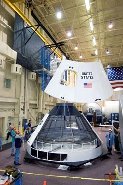 Image to right: A mockup of NASA's new spacecraft comes together. Credit: NASA